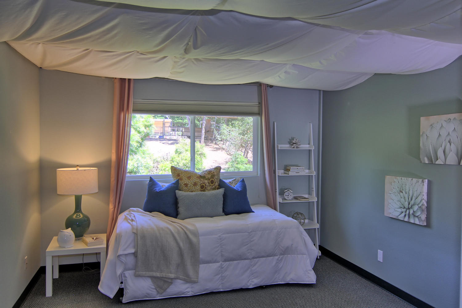 1442 South Rice Road Ojai, CA 93023 - Photo 20 of 50 a bedroom with a bed and window