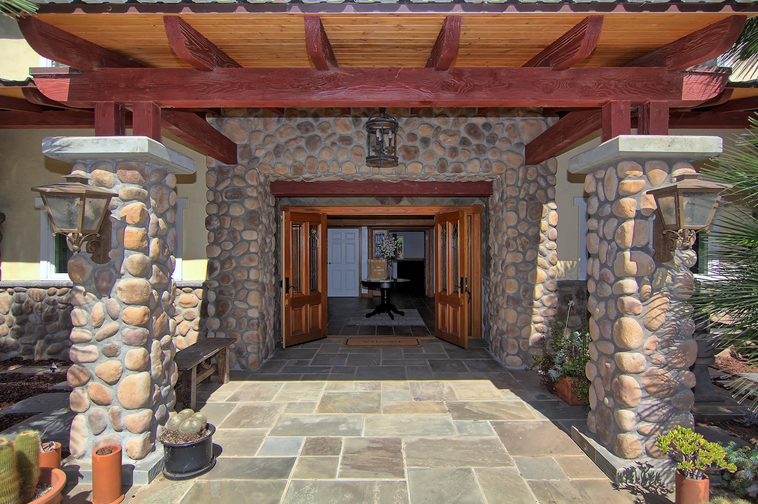 1442 South Rice Road Ojai, CA 93023 - Photo 3 of 50 a view of a porch with a table and chairs
