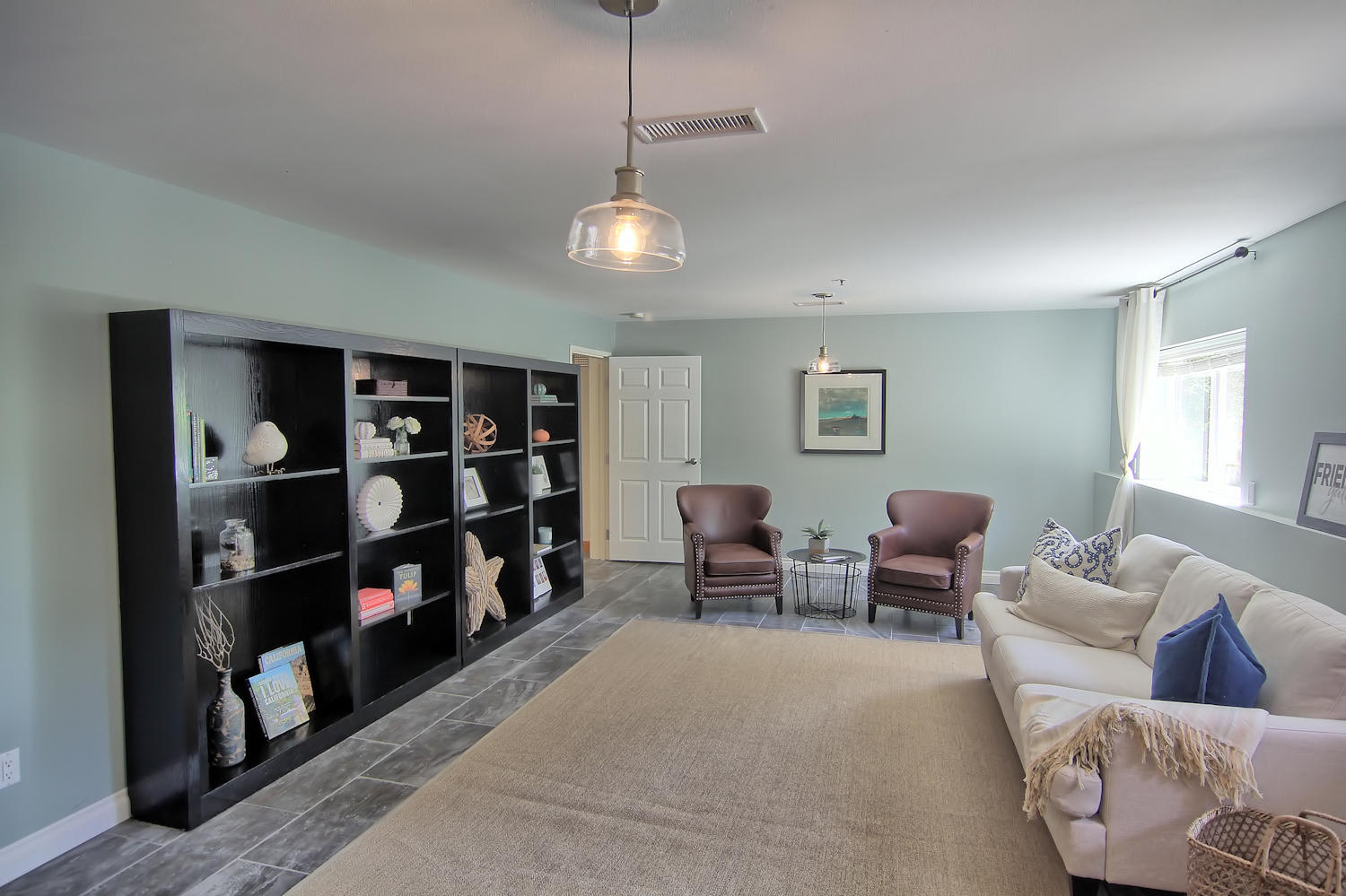 1442 South Rice Road Ojai, CA 93023 - Photo 6 of 50 a living room with furniture cabinets and a window