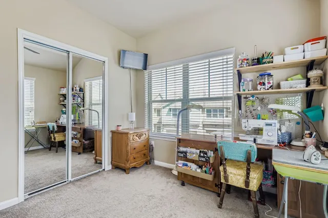 a room with furniture and a large window