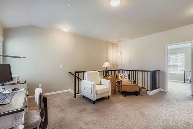 a bed room with furniture and a window