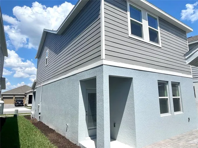 a view of backyard of house
