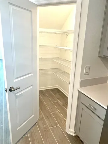 a bathroom with a tub and shower