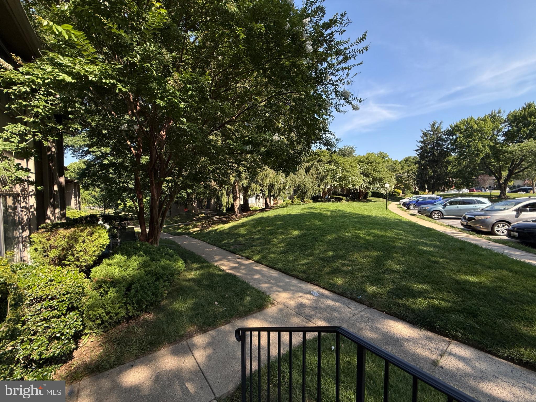 9455 Horizon Run Road, Unit 8 Gaithersburg, MD 20886 - Photo 25 of 25 Lush greenery and inviting pathways.