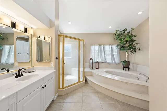a view of a swimming pool with a table and chairs