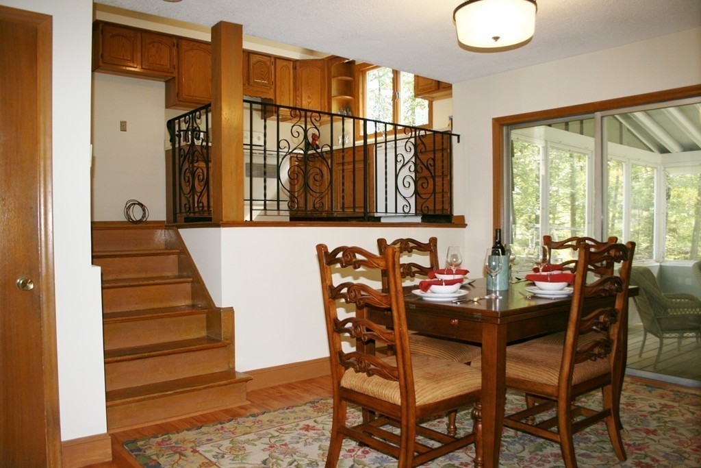 22 Long Meadow Road Chelmsford, MA 01824 - Photo 6 of 12 a dining room with furniture and wooden floor
