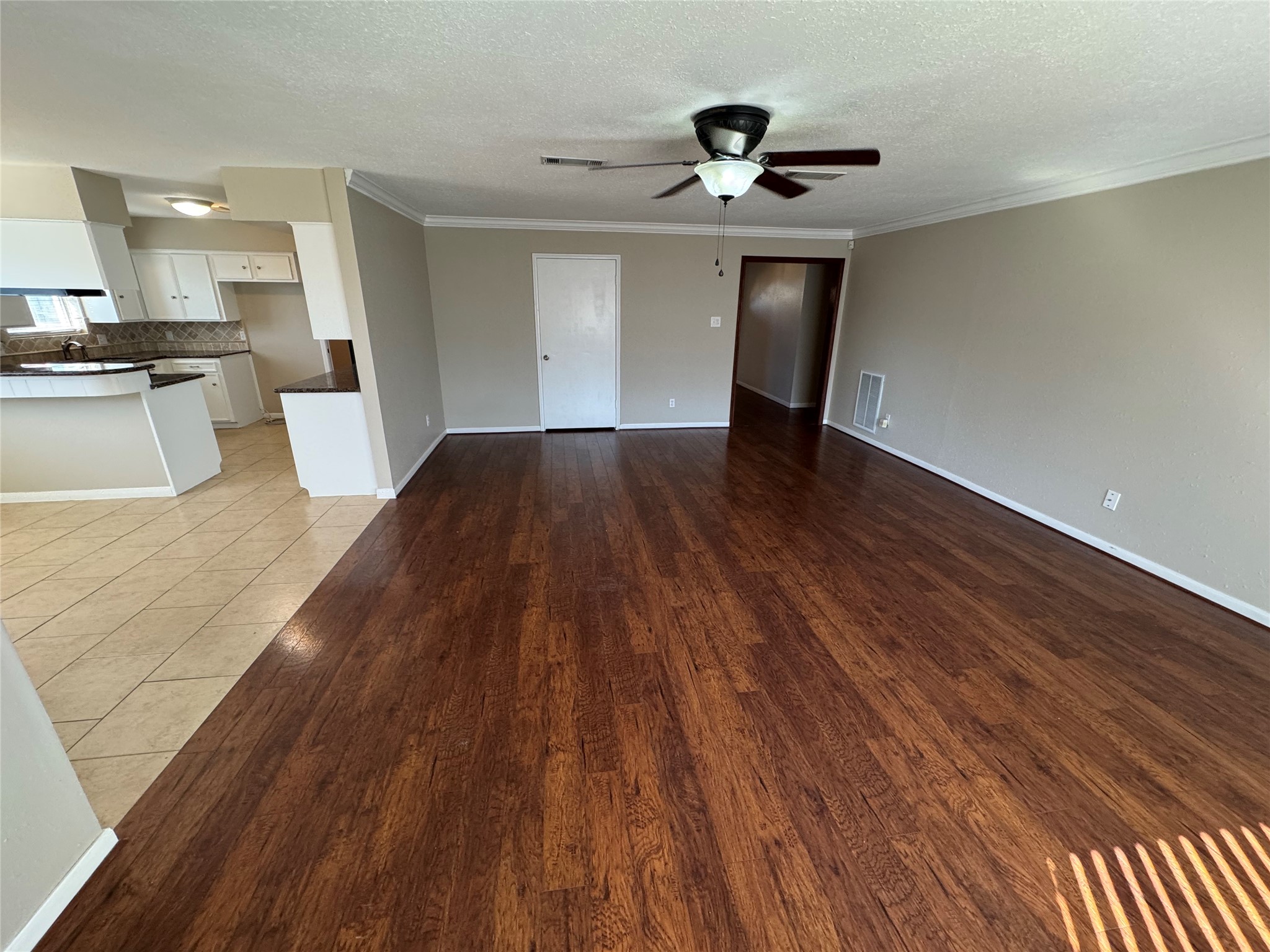 171 Bluebonnet Street Sugar Land, TX 77478 - Photo 14 of 28 a view of a kitchen from the hallway