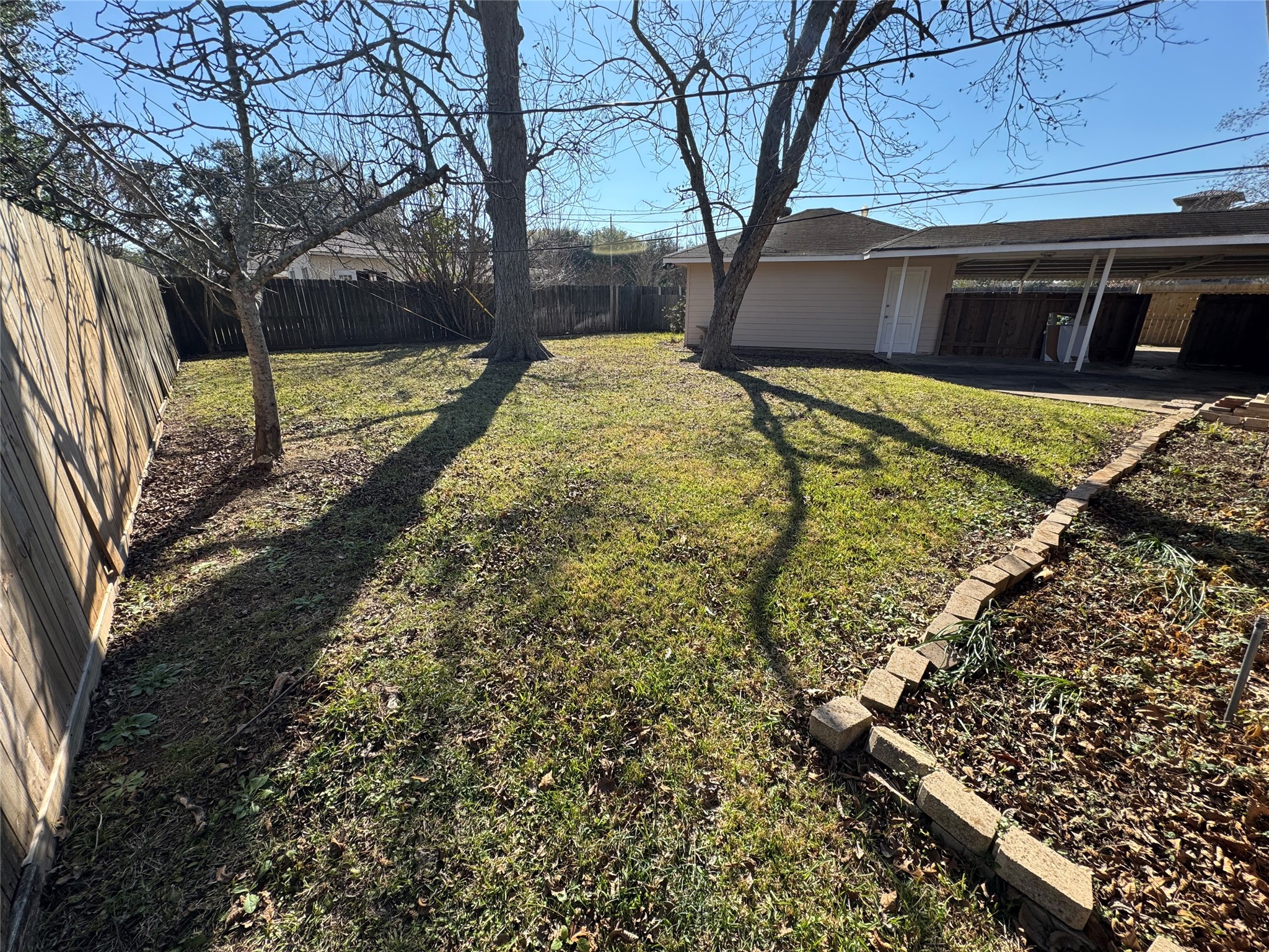 171 Bluebonnet Street Sugar Land, TX 77478 - Photo 26 of 28 a view of a backyard of the house