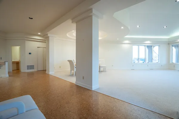 a view of an empty room and window