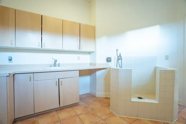 a bathroom with a sink and a mirror