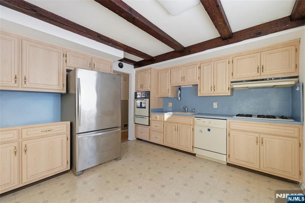 6 Brookside Avenue Hackettstown, NJ 07840 - Photo 13 of 36 a kitchen with cabinets stainless steel appliances and a counter space