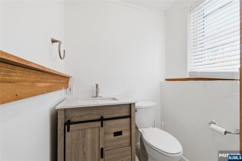 6 Brookside Avenue Hackettstown, NJ 07840 - Photo 28 of 36 a bathroom with a granite countertop toilet sink and mirror