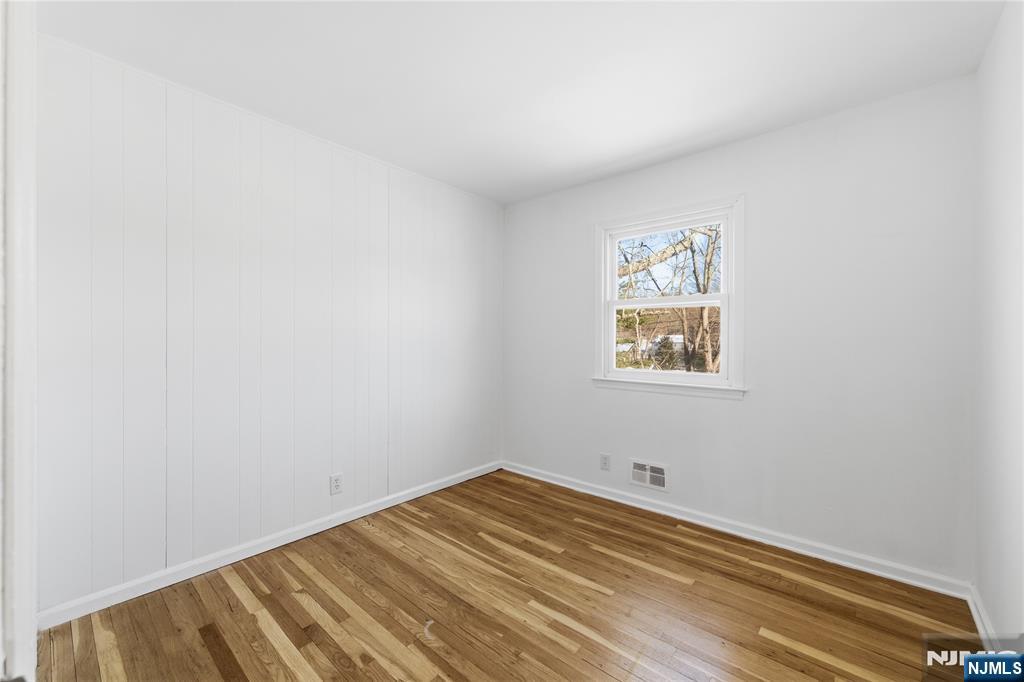 6 Brookside Avenue Hackettstown, NJ 07840 - Photo 34 of 36 a view of a room with wooden floor and wall painting