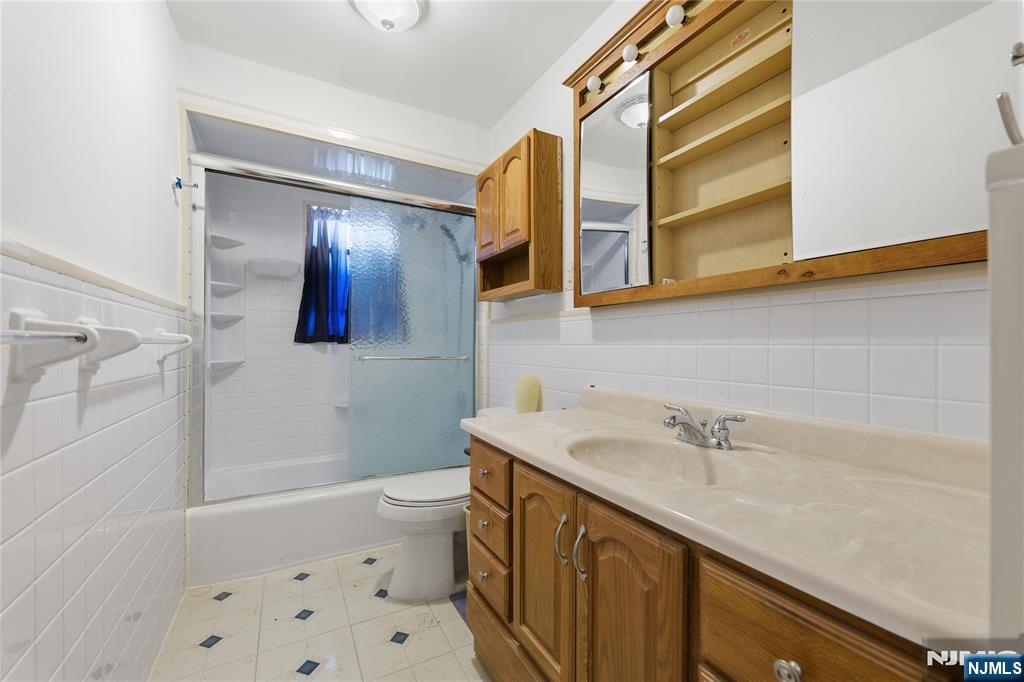 6 Brookside Avenue Hackettstown, NJ 07840 - Photo 36 of 36 a bathroom with a sink a toilet and shower