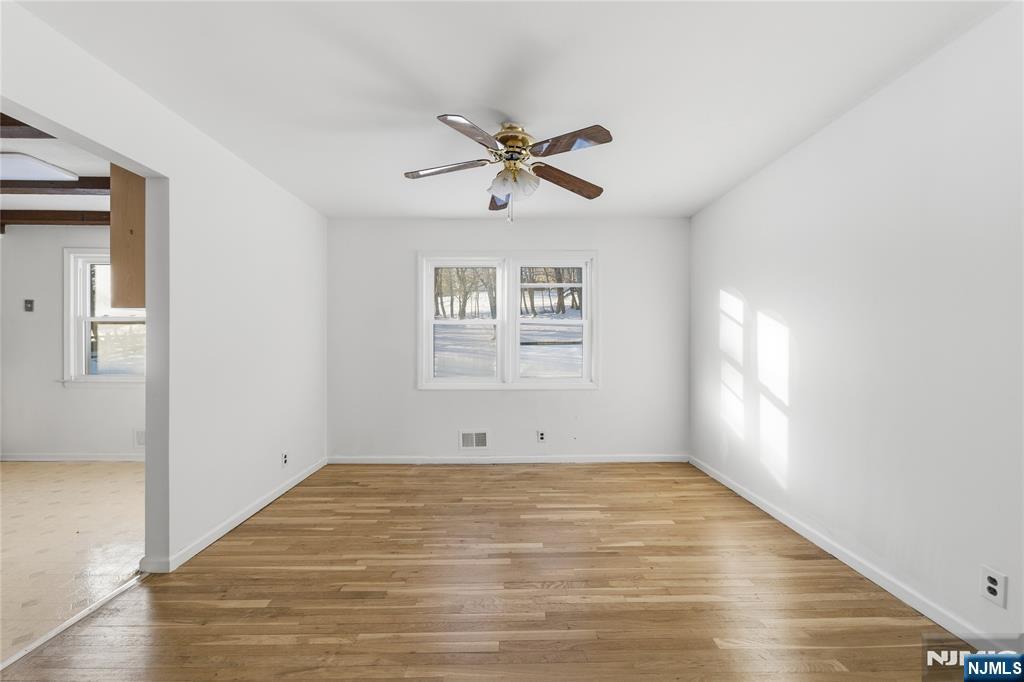 6 Brookside Avenue Hackettstown, NJ 07840 - Photo 7 of 36 an empty room with windows and fan