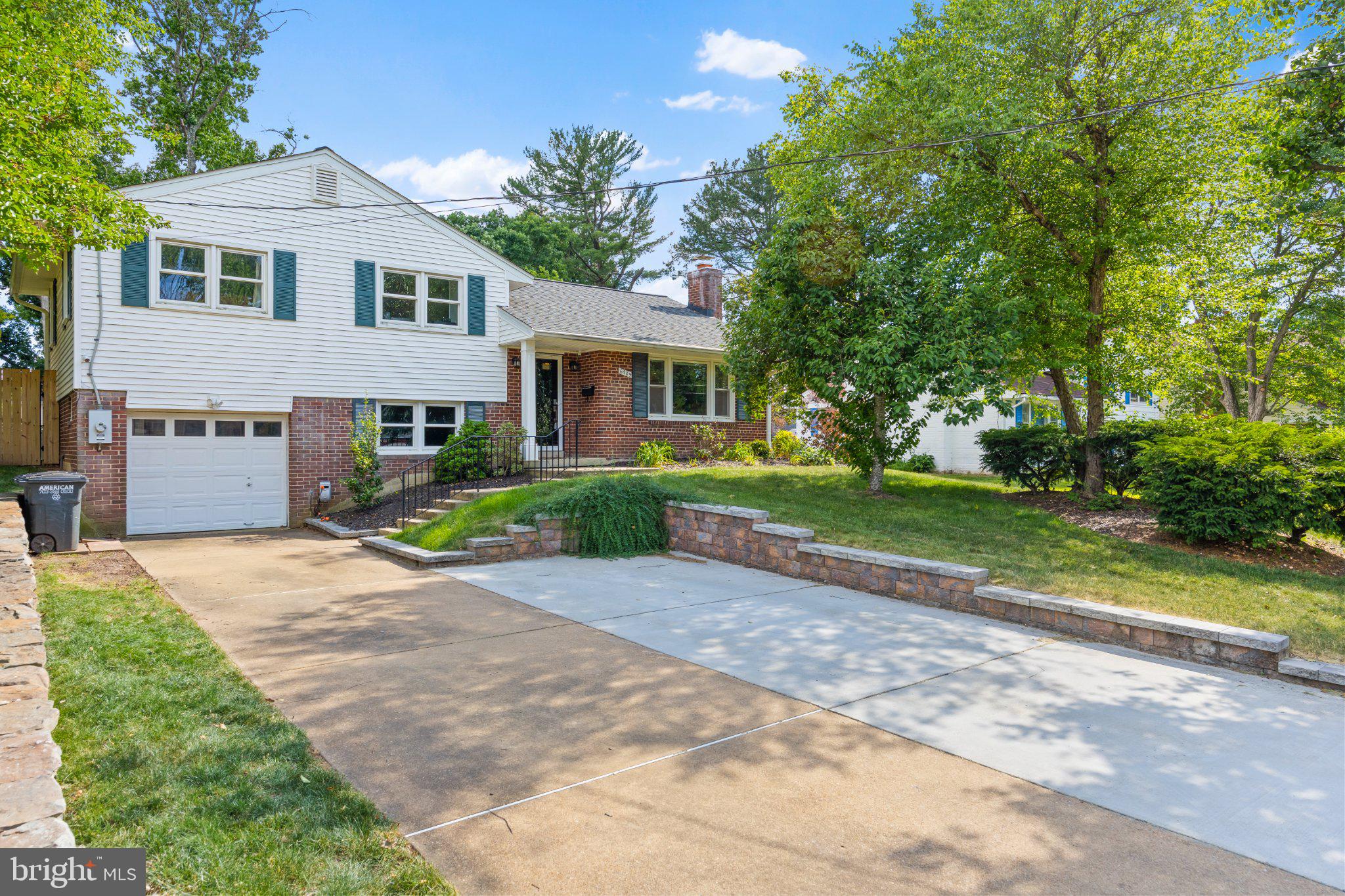 6705 New Hope Drive Springfield, VA 22151 - Photo 4 of 67 Charming home with lush greenery.