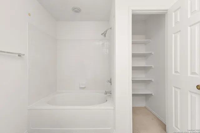 a bathroom with a bathtub