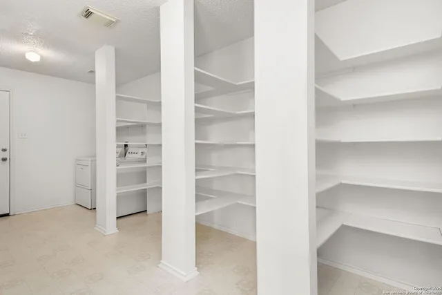 a view of a room with rack on the wall