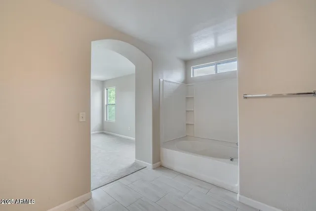 a bathroom with a bathtub