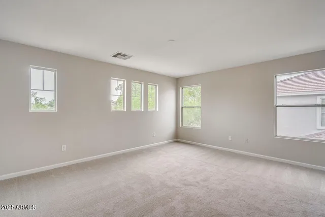 an empty room with windows