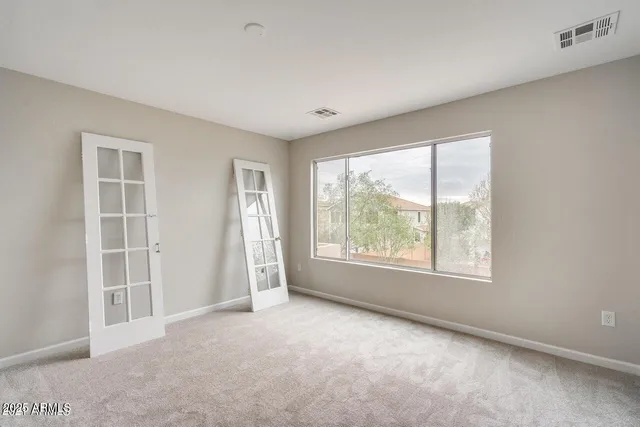 an empty room with windows