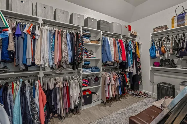 a bathroom with a double vanity sink mirror and