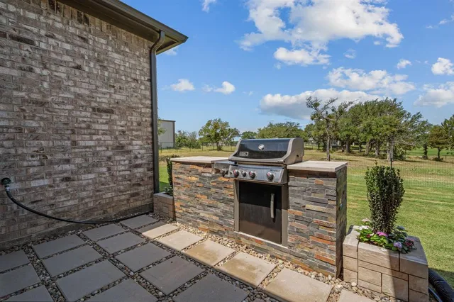 a view of a golf course with a lake