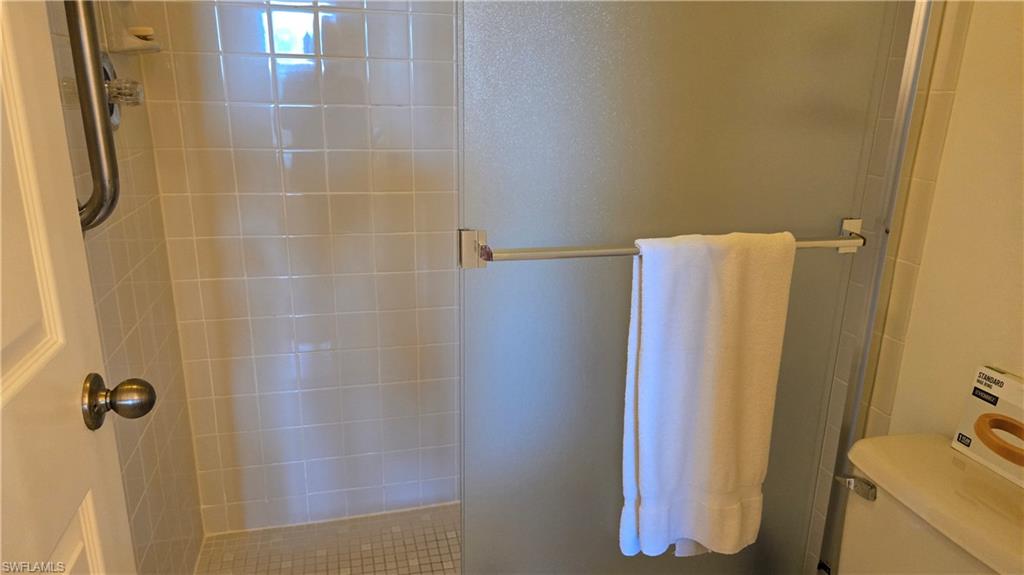 4580 Andover Way, Unit 305B Naples, FL 34112 - Photo 13 of 32 Primary bath with walki-in shower