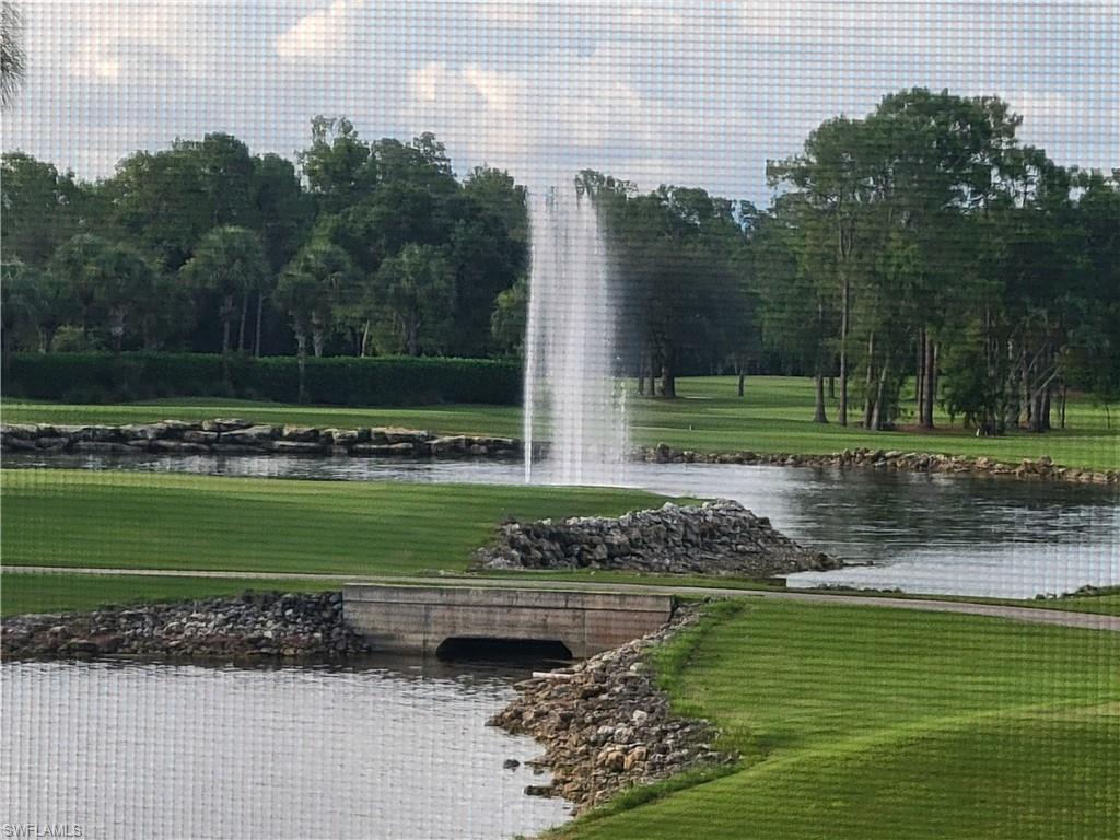 4580 Andover Way, Unit 305B Naples, FL 34112 - Photo 32 of 32 One of the Royal Wood fountains adding to the ambience of the golf course