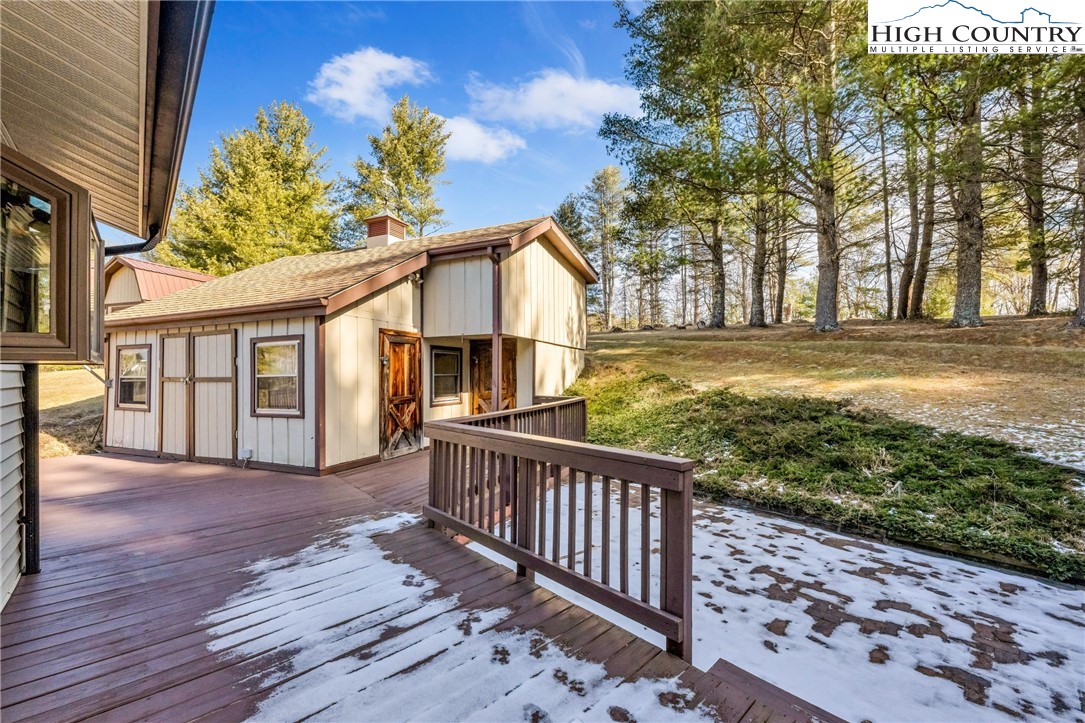 1324 Ripshin Road Troutdale, VA 24378 - Photo 16 of 47 a view of a house with backyard and wooden fence