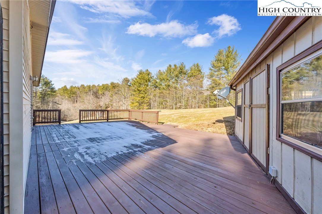 1324 Ripshin Road Troutdale, VA 24378 - Photo 17 of 47 a view of a balcony with wooden floor and fence