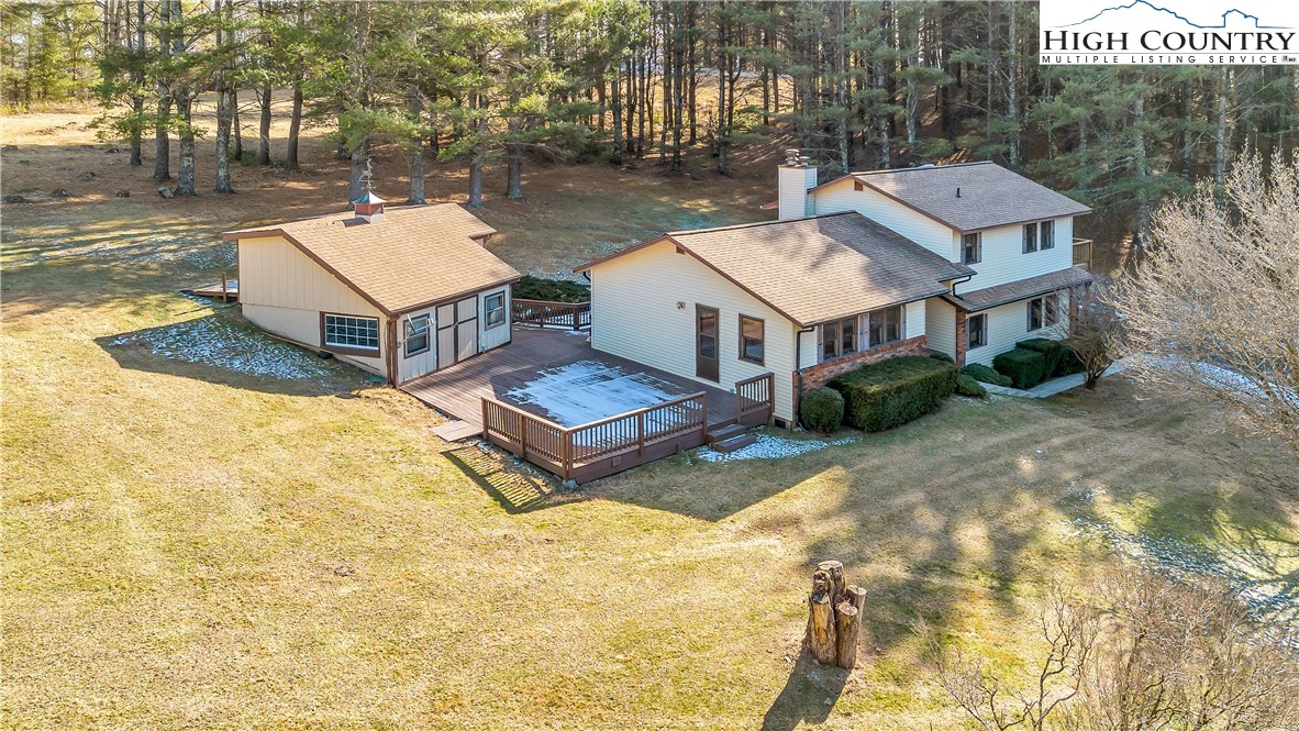 1324 Ripshin Road Troutdale, VA 24378 - Photo 2 of 47 an aerial view of a house with a yard