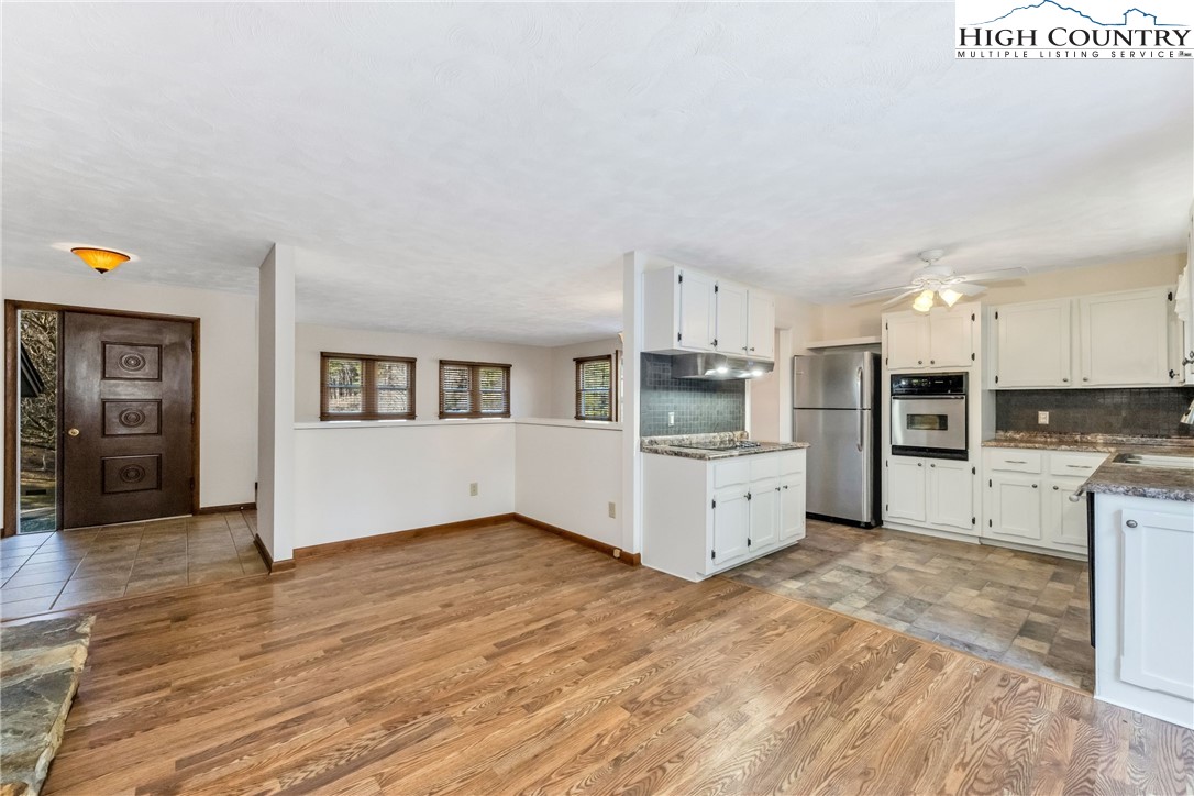1324 Ripshin Road Troutdale, VA 24378 - Photo 22 of 47 a view of kitchen with wooden floor
