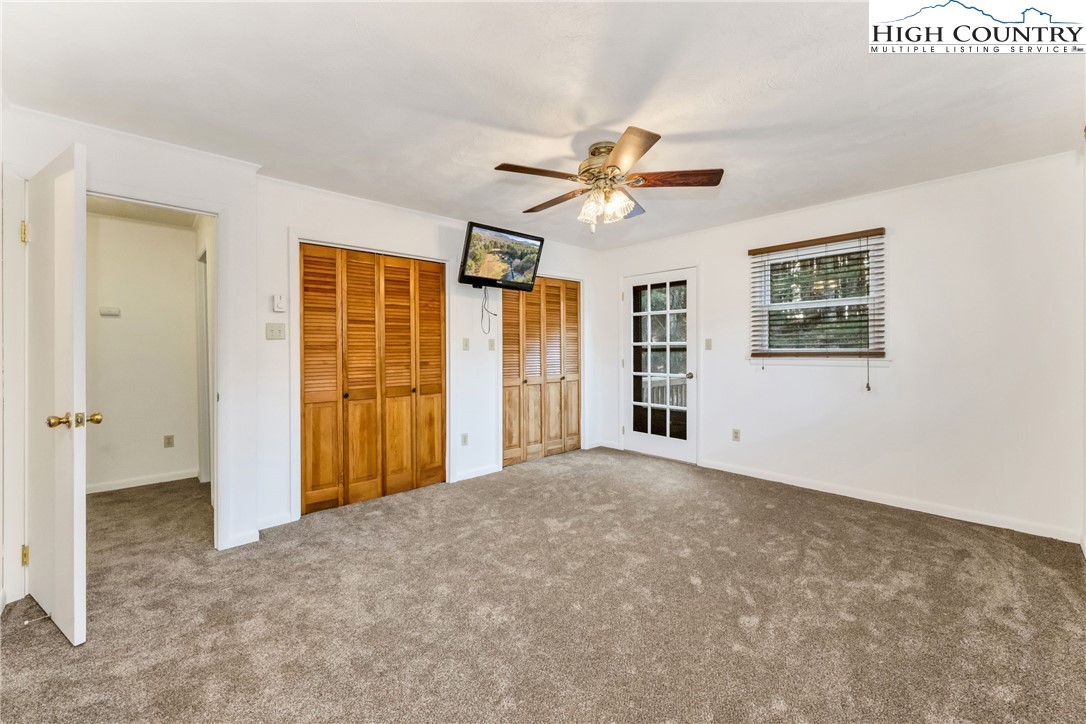 1324 Ripshin Road Troutdale, VA 24378 - Photo 32 of 47 an empty room with windows and cabinet