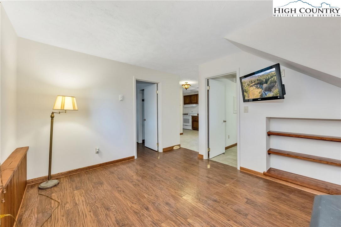 1324 Ripshin Road Troutdale, VA 24378 - Photo 35 of 47 a view of empty room with wooden floor