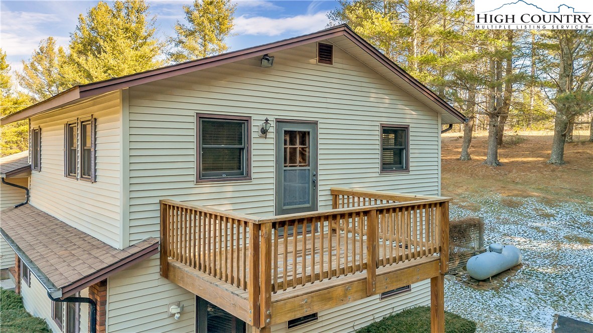 1324 Ripshin Road Troutdale, VA 24378 - Photo 8 of 47 a view of a house with a deck