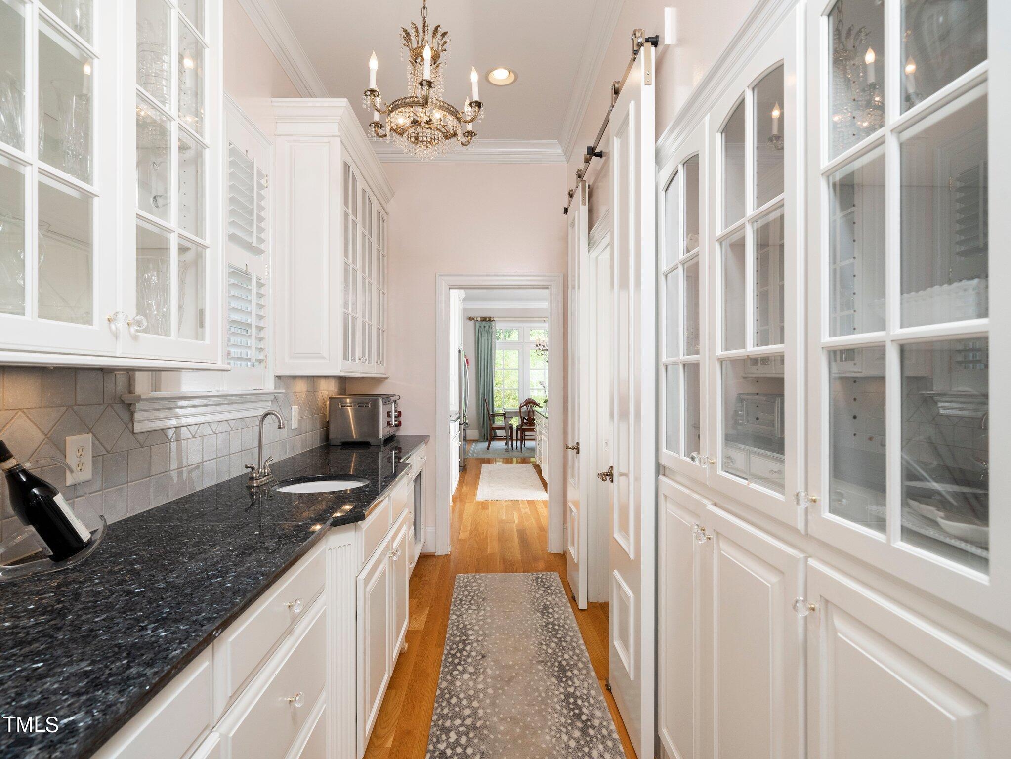 2512 Lewiswood Lane Raleigh, NC 27608 - Photo 12 of 41 a large white kitchen with granite countertop lots of counter top space
