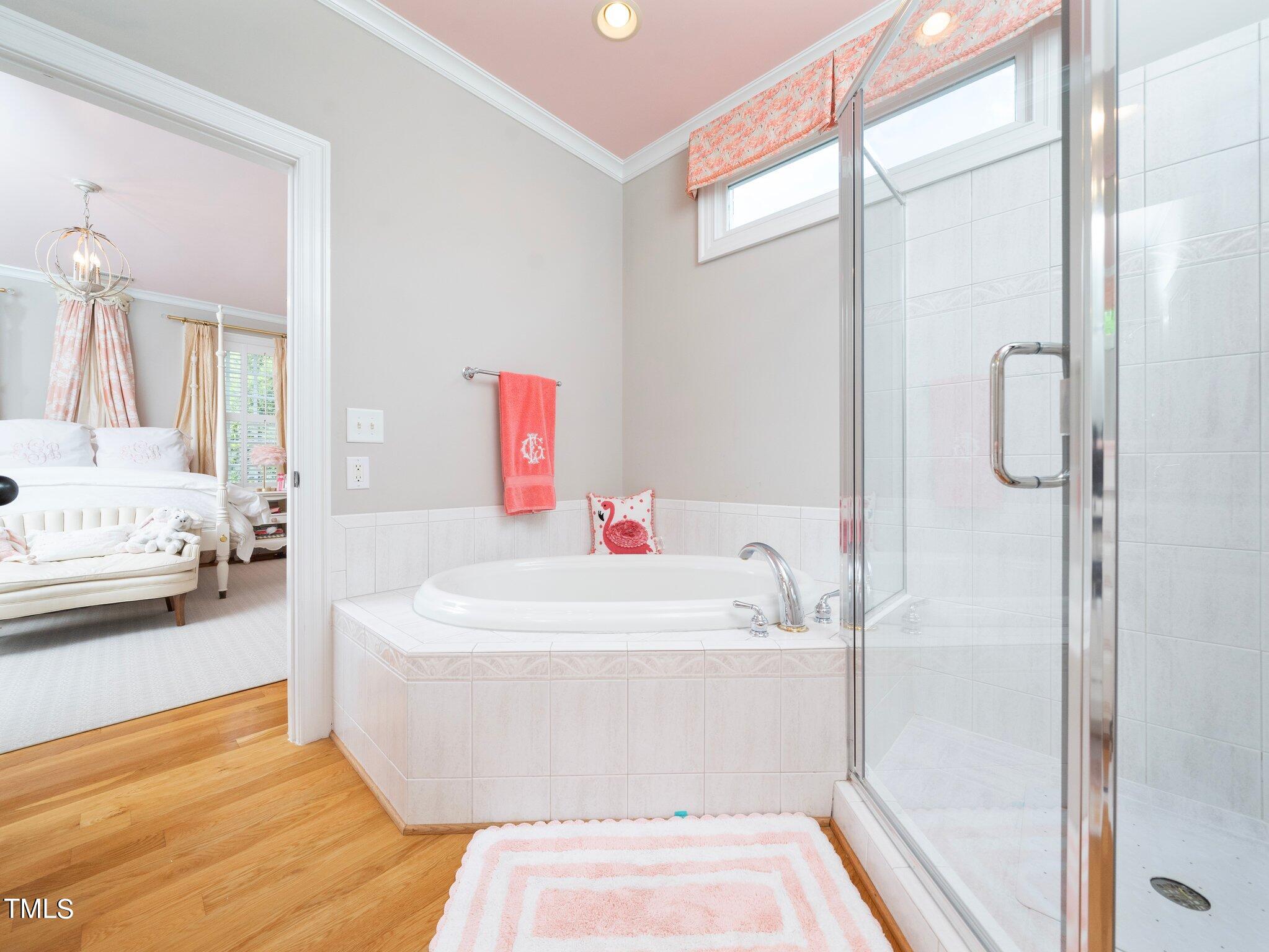 2512 Lewiswood Lane Raleigh, NC 27608 - Photo 23 of 41 a white bath tub sitting next to a white sink