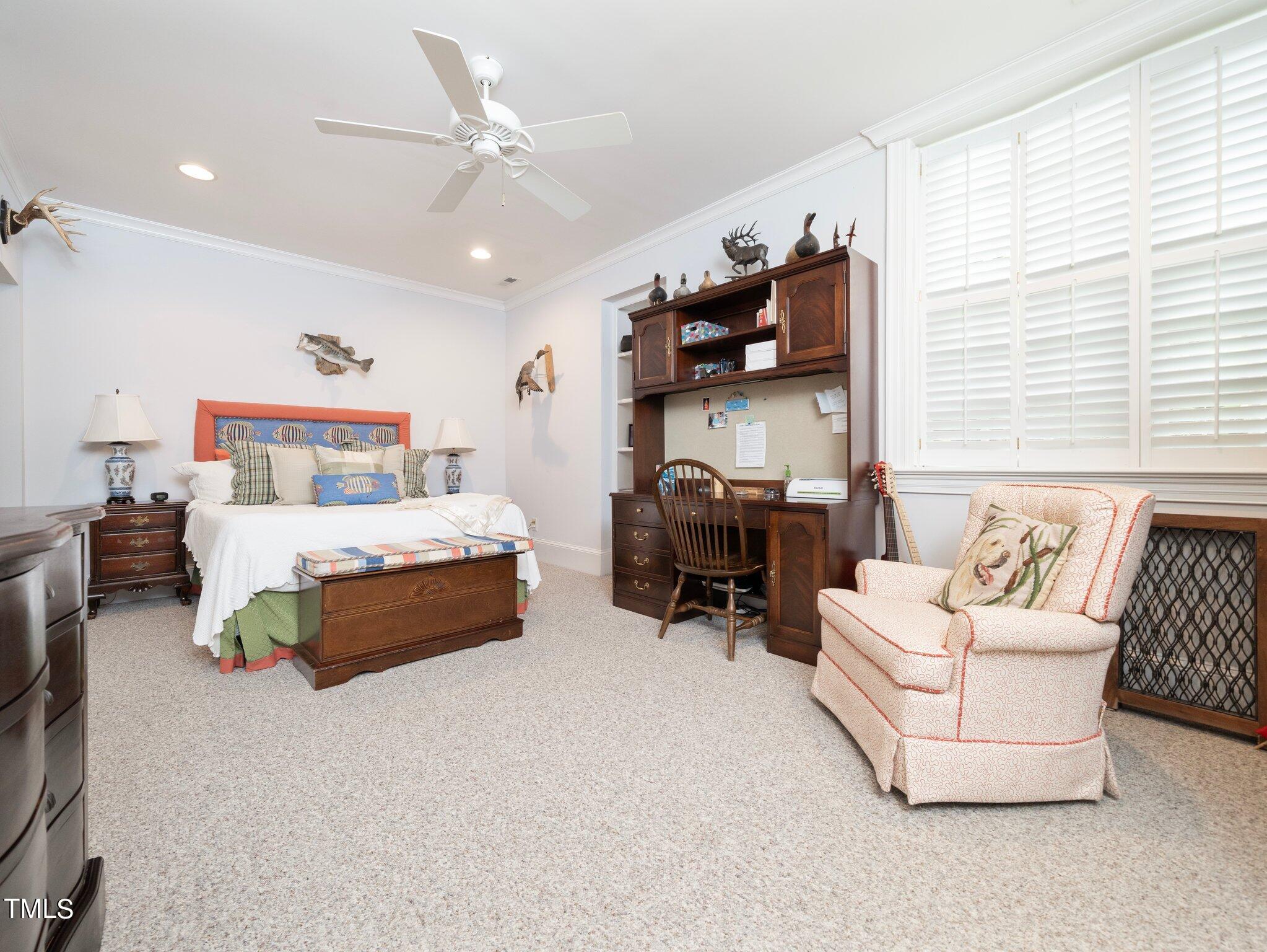 2512 Lewiswood Lane Raleigh, NC 27608 - Photo 29 of 41 a bedroom with furniture and a large window