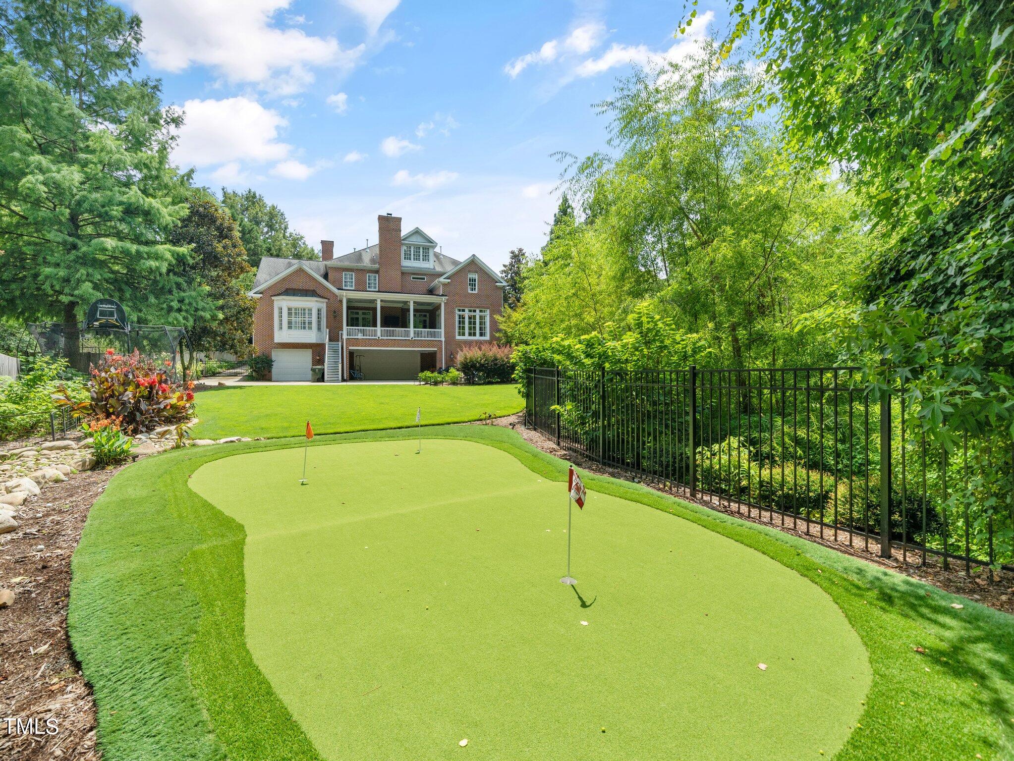 2512 Lewiswood Lane Raleigh, NC 27608 - Photo 37 of 41 a view of a house with a backyard and swimming pool