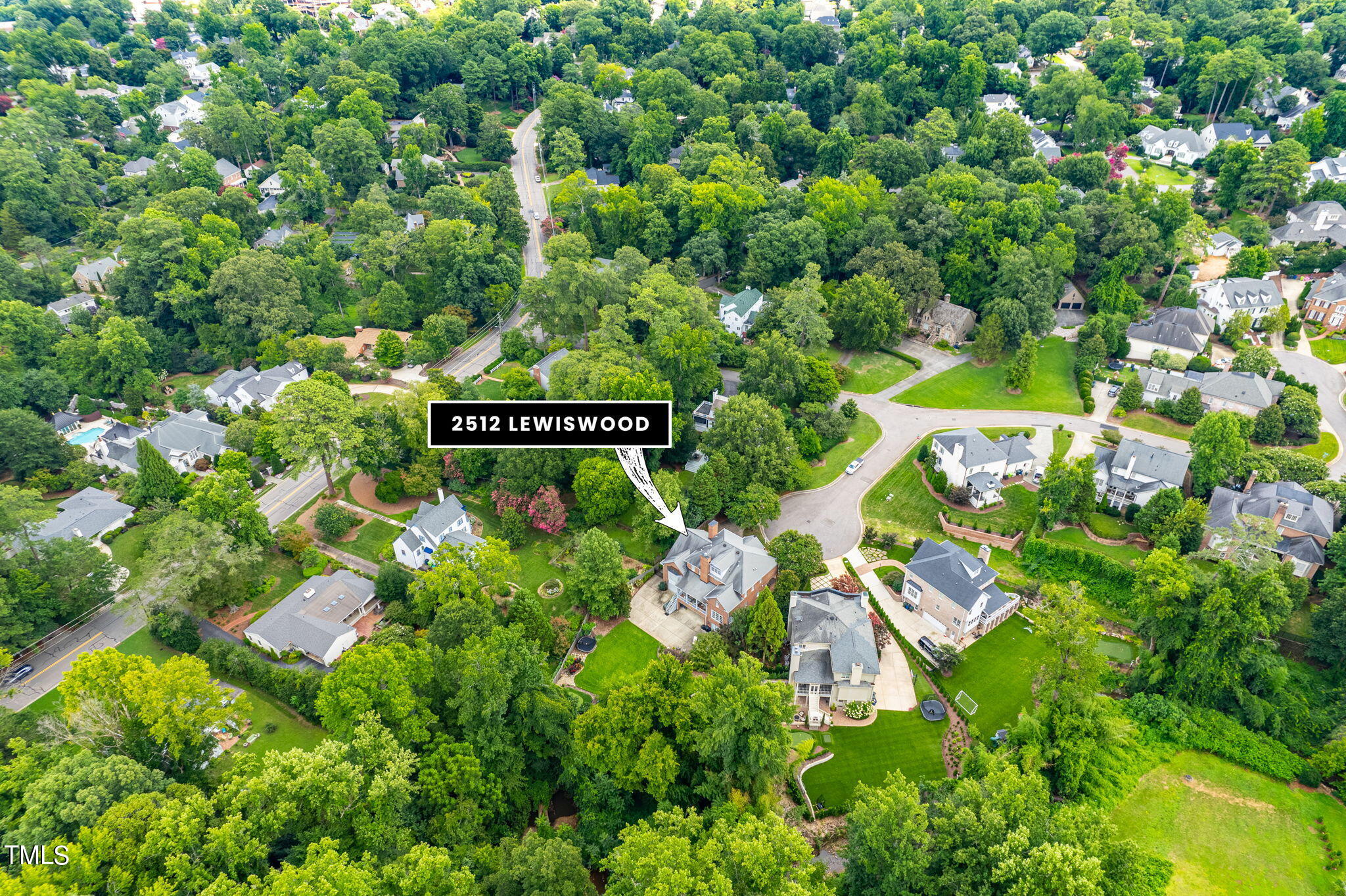 2512 Lewiswood Lane Raleigh, NC 27608 - Photo 40 of 41 a view of a sign in a garden
