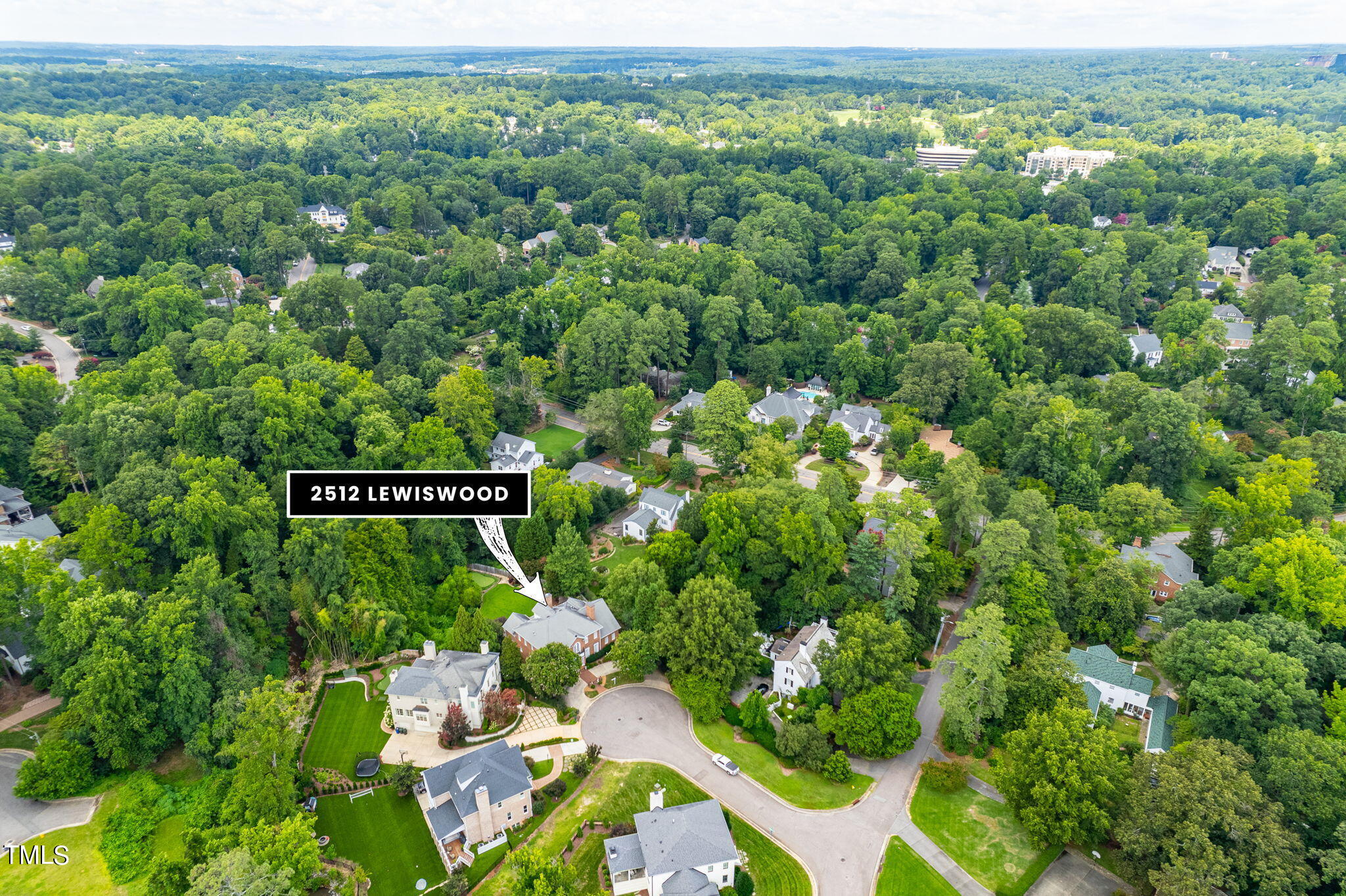2512 Lewiswood Lane Raleigh, NC 27608 - Photo 41 of 41 an aerial view of a house with yard