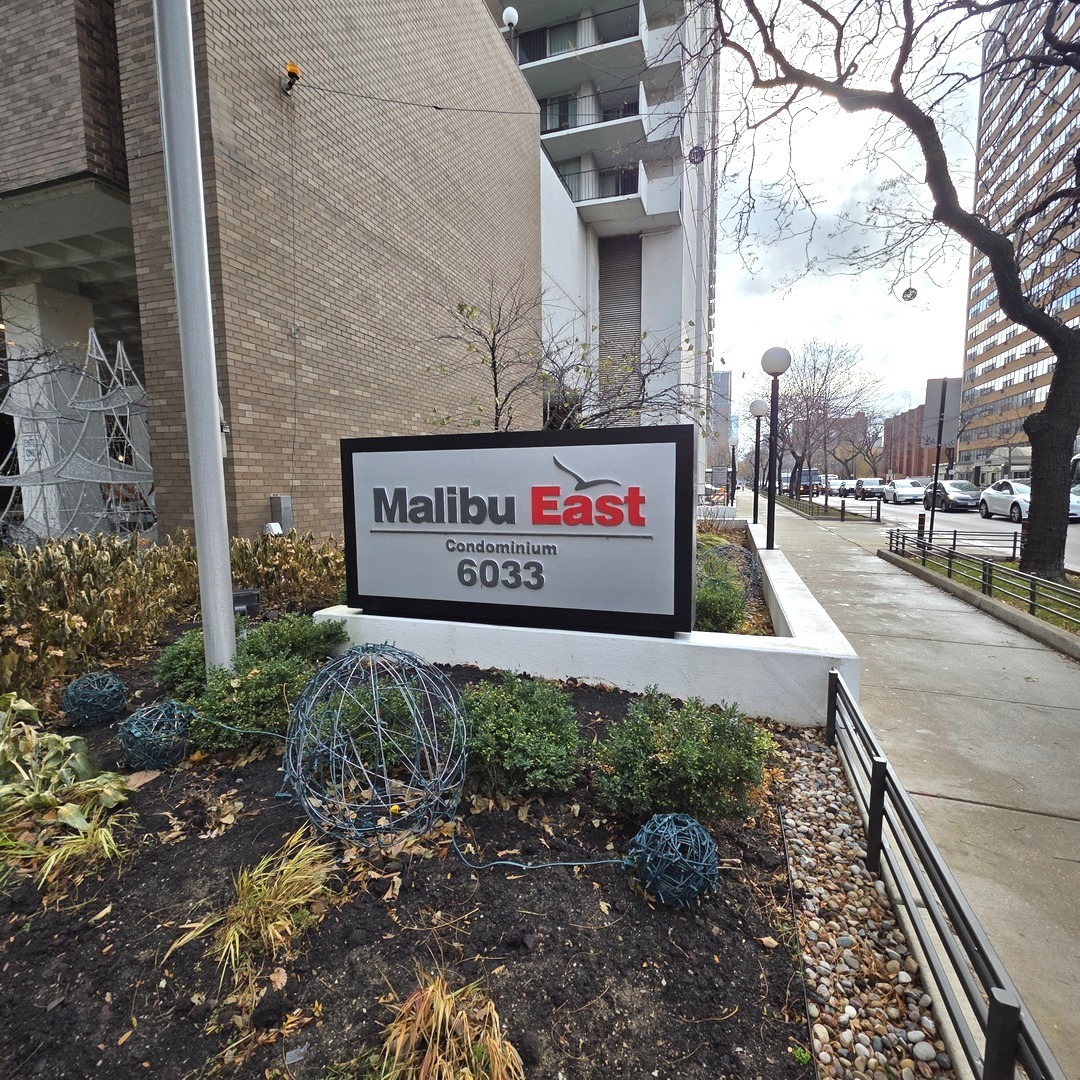 6033 North Sheridan Road, Unit 5G Chicago, IL 60660 - Photo 24 of 24 a sign on the side of a building