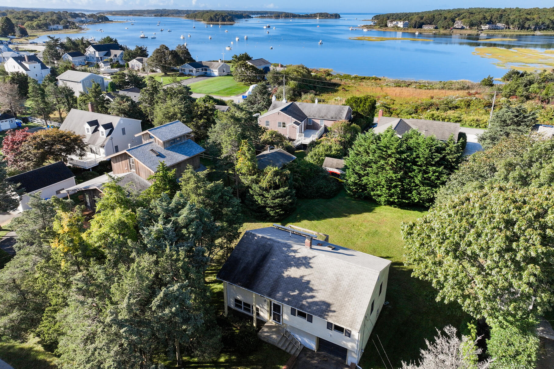 an aerial view of residential houses with outdoor space