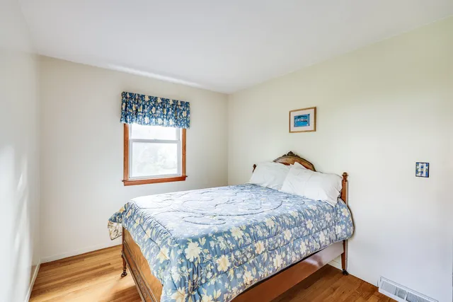 a view of a backyard with swimming pool