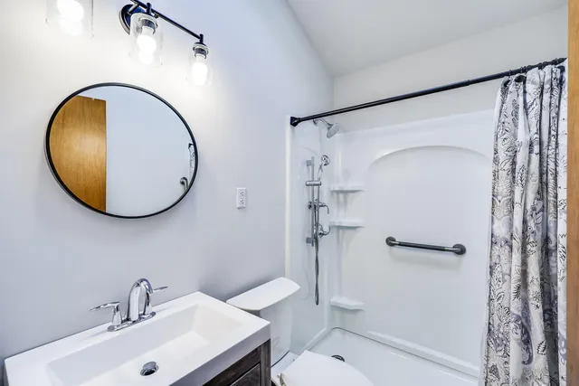 a view of a swimming pool with a deck