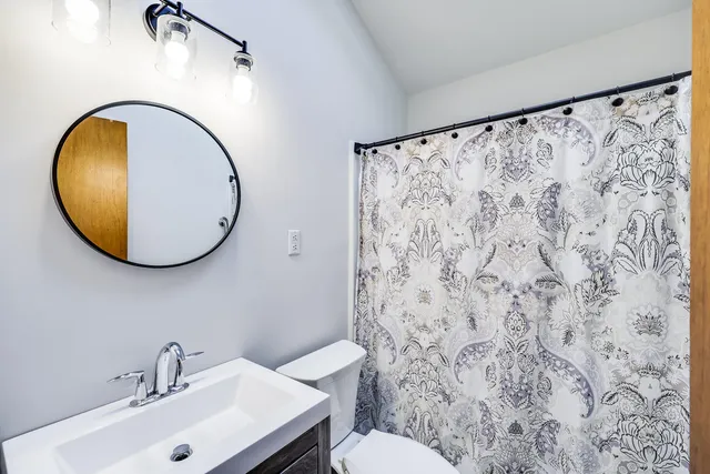 a view of balcony with wooden floor