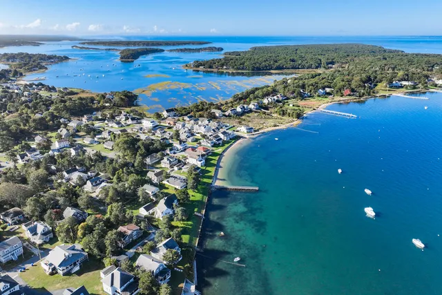 a view of house with backyard and garden