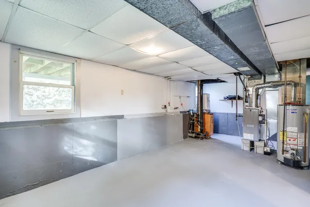 a view of a hallway with windows