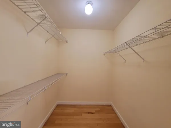 a view of a kitchen from the hallway